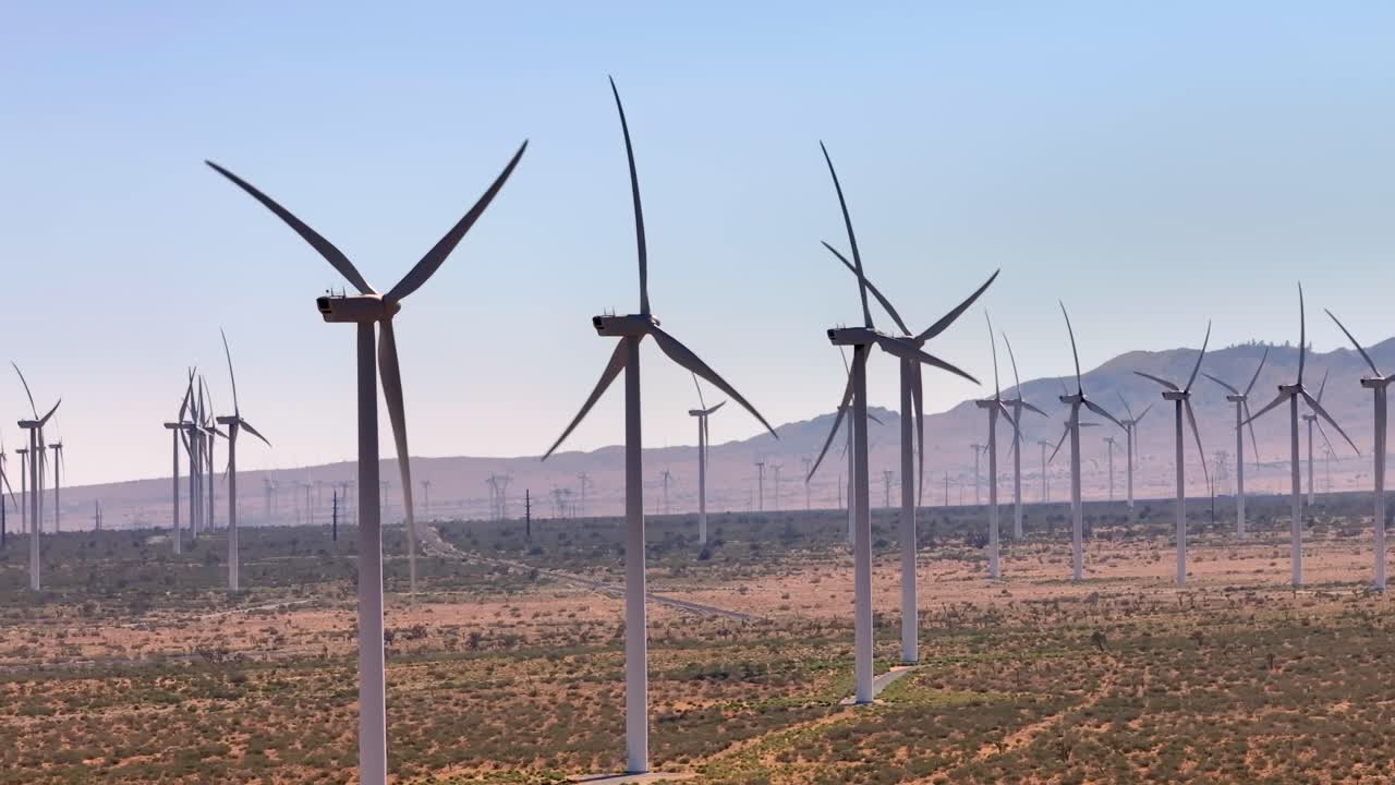 Wind turbine farm in California's Mojave Desert, aerial static shot