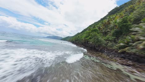 FPV-drone-traveling-along-beautiful-coast-of-the-Dominican-Republic