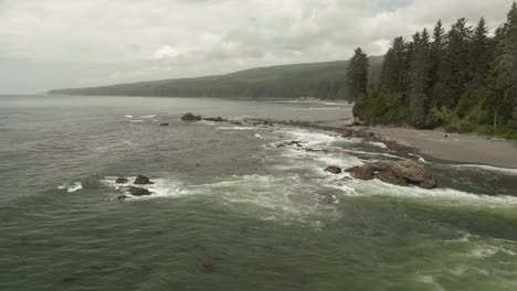 Beautiful-Aerial-Panoramic-Landscape-View-of-the-Rocky-Pacific-Ocean-Coast-in-the-Southern-Vancouver-Island-during-a-sunny-summer-day