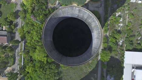 Drone-Orbiting-Over-Cooling-Towers-Of-HeidelbergCement-Militari-Plant-In-Bucharest,-Romania