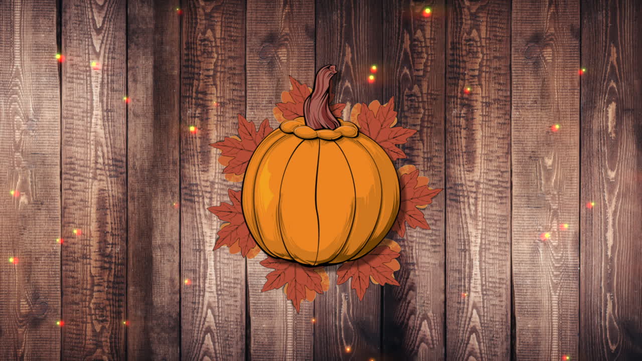 calabazas naranjas y hojas de otoño en madera