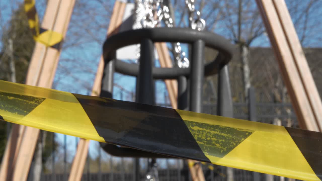 The playground is closed, close-up, slow motion