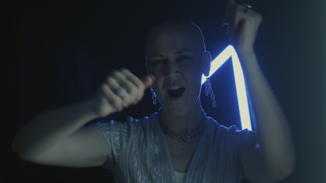 Woman Dancing in Neon Lights