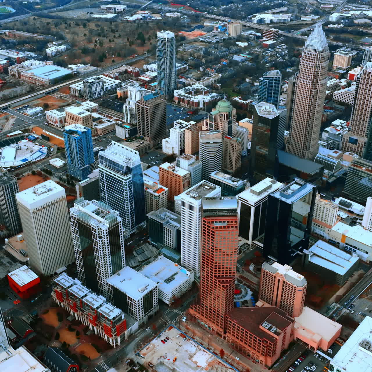 High-rise architecture in the downtown of American metropolis. Aerial view of the vast cityscape from top