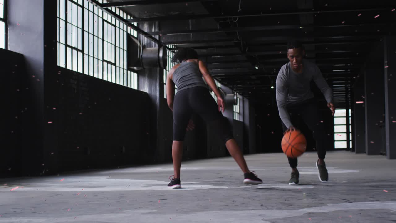 Man starting dribble, woman defending side, ball trail showing crossover for basketball training