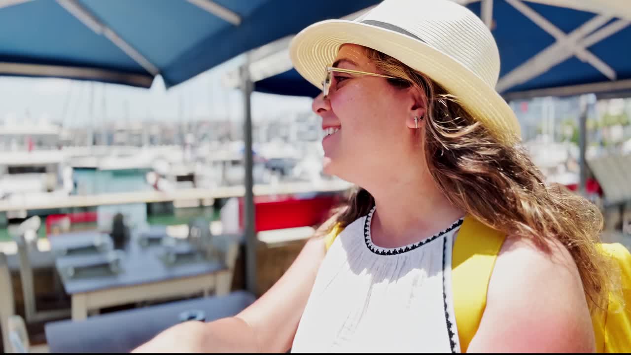 Greek Summer Day: Woman at Marina Cafe Table