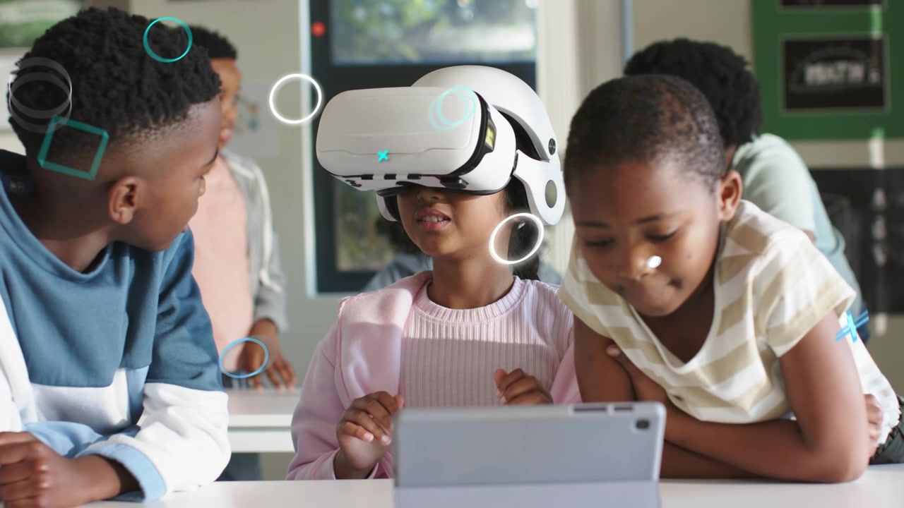 VR user reacting to tablet input, peers observing, animated overlays aiding education