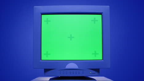 vintage computer monitor with green screen