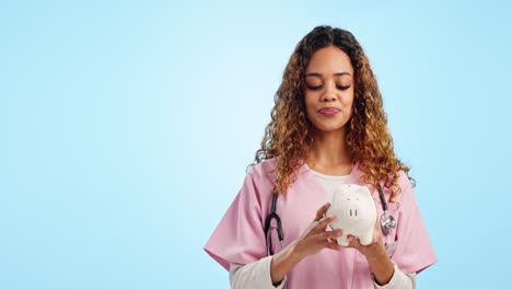 Nurse-woman,-piggy-bank-and-money-in-studio