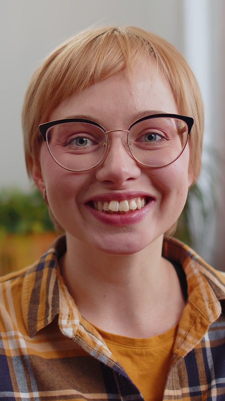 Happy calm woman smiling friendly glad expression feel satisfied concept good news celebrate win