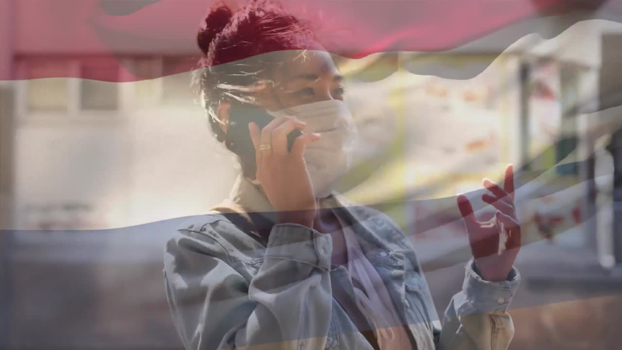 animación de la bandera de los países bajos ondeando sobre una mujer con máscaras faciales