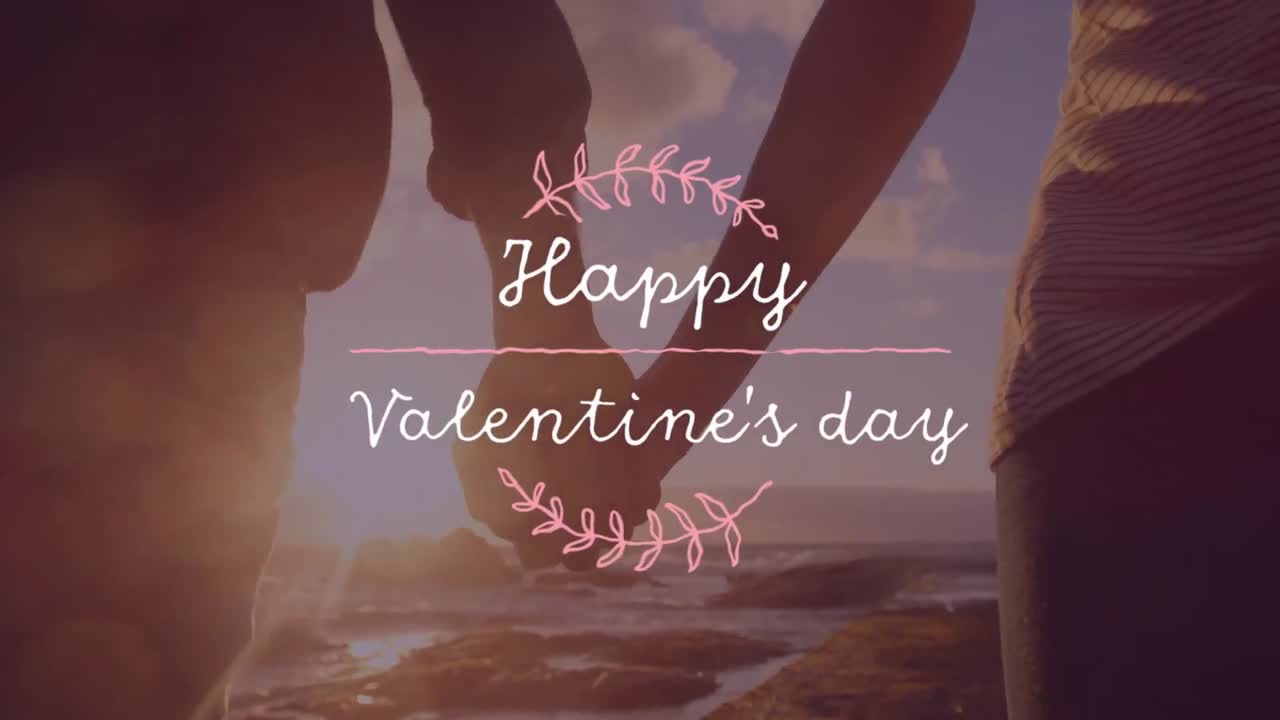 Animation of happy valentines day with a couple in love in black background