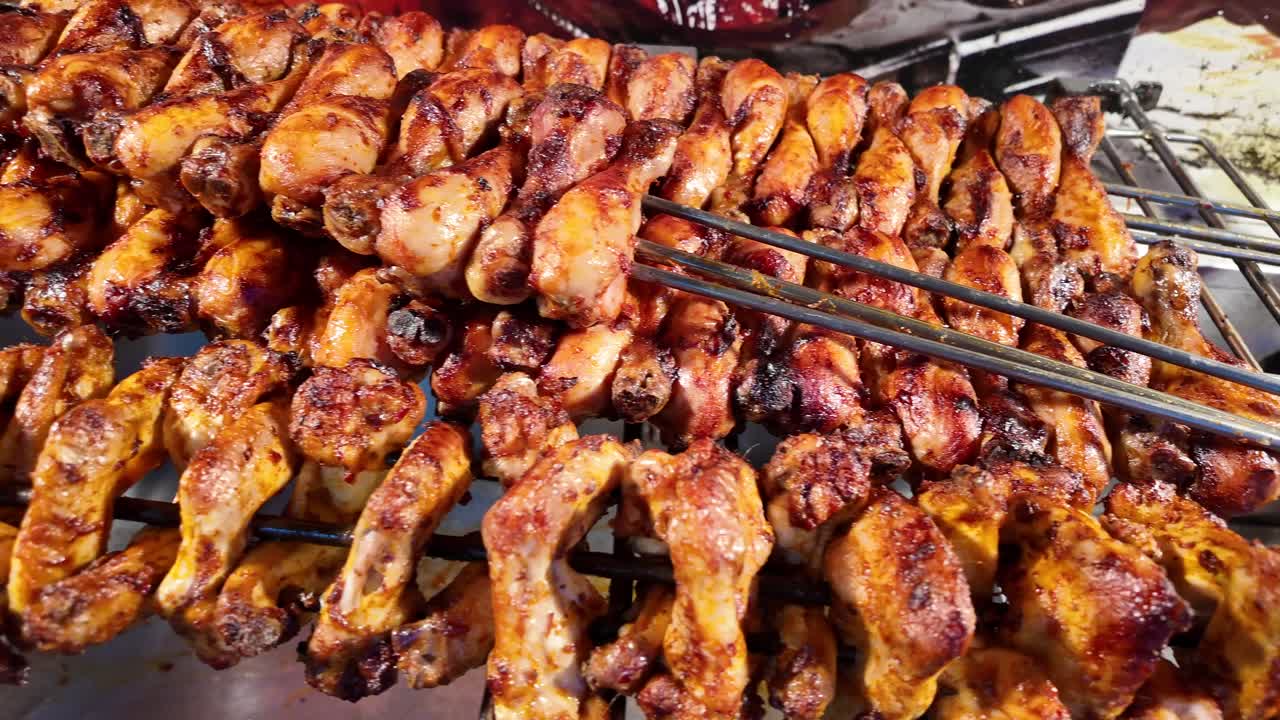 Grilled Chicken Drumsticks and Wings on Skewers
