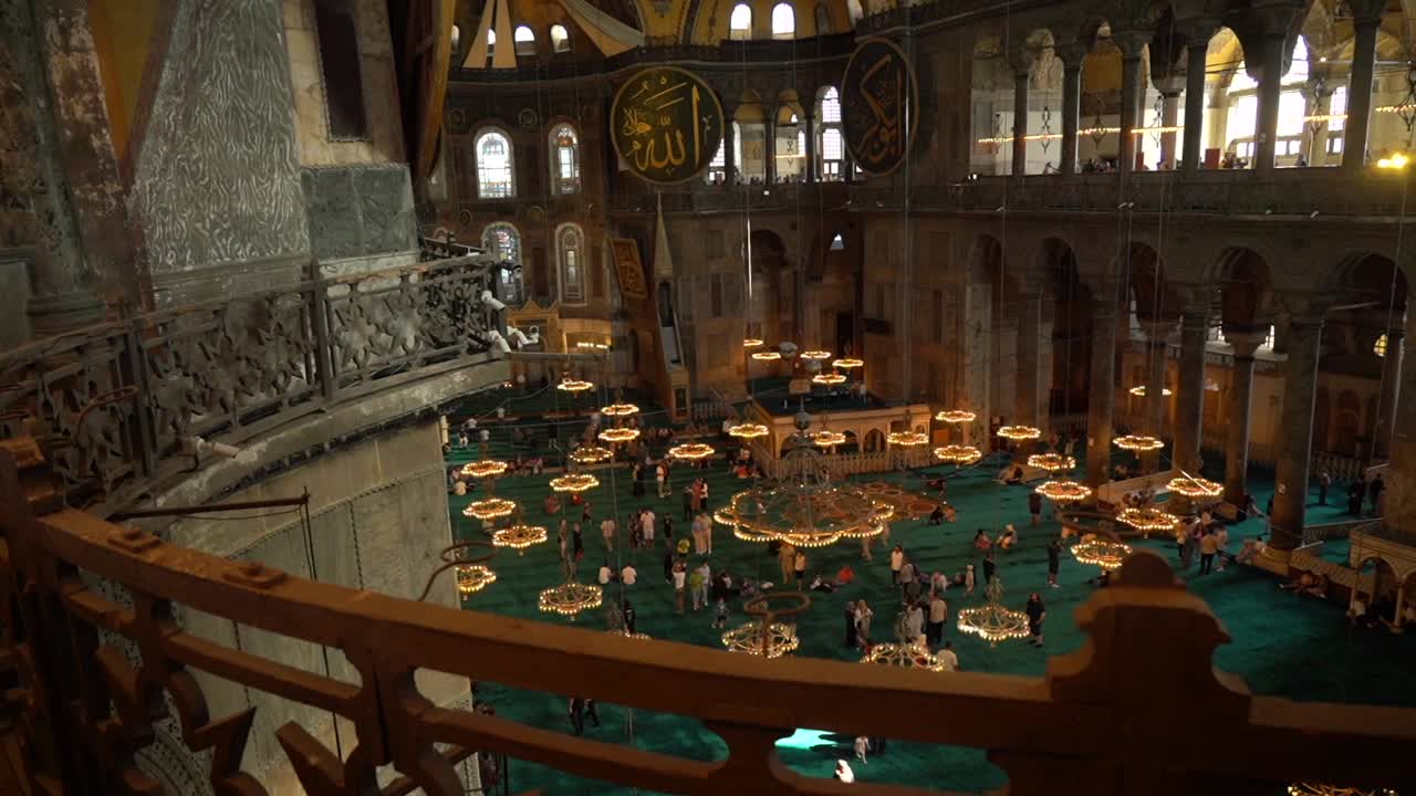 The camera pans from the dome of the Hagia Sophia to the prayer hall