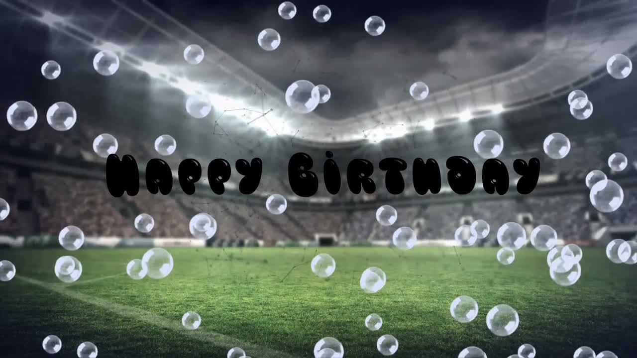 스포츠 경기장 위에 생일 축하 텍스트와 거품의 애니메이션