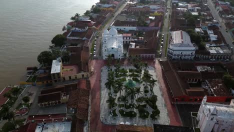 reverse drone shot of downtown tlacotalpan, veracruz