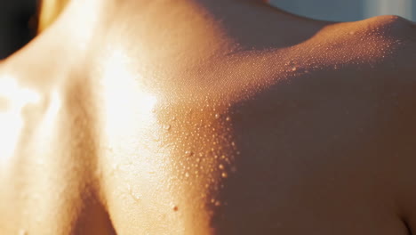close-up of human skin with water droplets