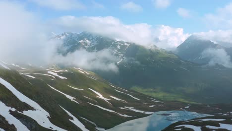 misty clouds over valleys near little saint bernard pass in rhone alpes region, france