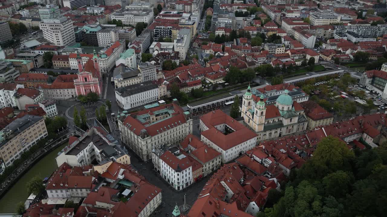 Old historical city center town of of Ljubljana, Slovenia with The Cathedral (Church of St. Nicholas) aerial drone footage above Europe