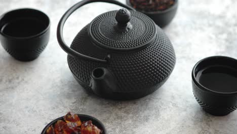 Traditional-eastern-metal-teapot-and-iron-cups
