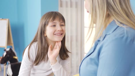 the mother and the little girl are chatting alone, having trouble, trying to solve the problems.