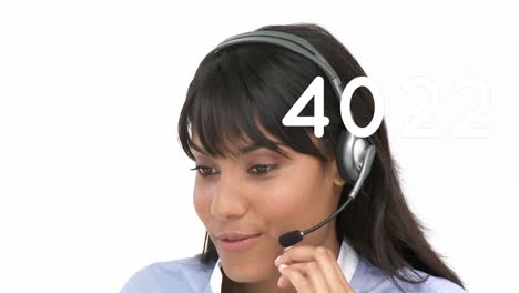 Animation-of-numbers-changing-over-businesswoman-using-phone-headset