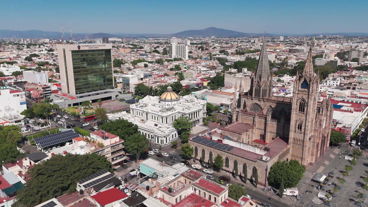 Aerial view of the Rectoria Building, Expiatorio parish and the Museo de las Artes in Guadalajara, Jalisco, Mexico, with the traffic of the Enrique Diaz de Leon avenue