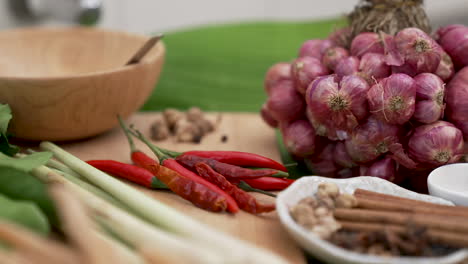 purple shallots, red chili, herbs and spices for traditional thai cuisine