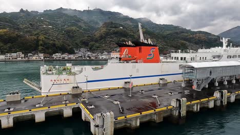 japanese ferry with mountains of shikoku in the background