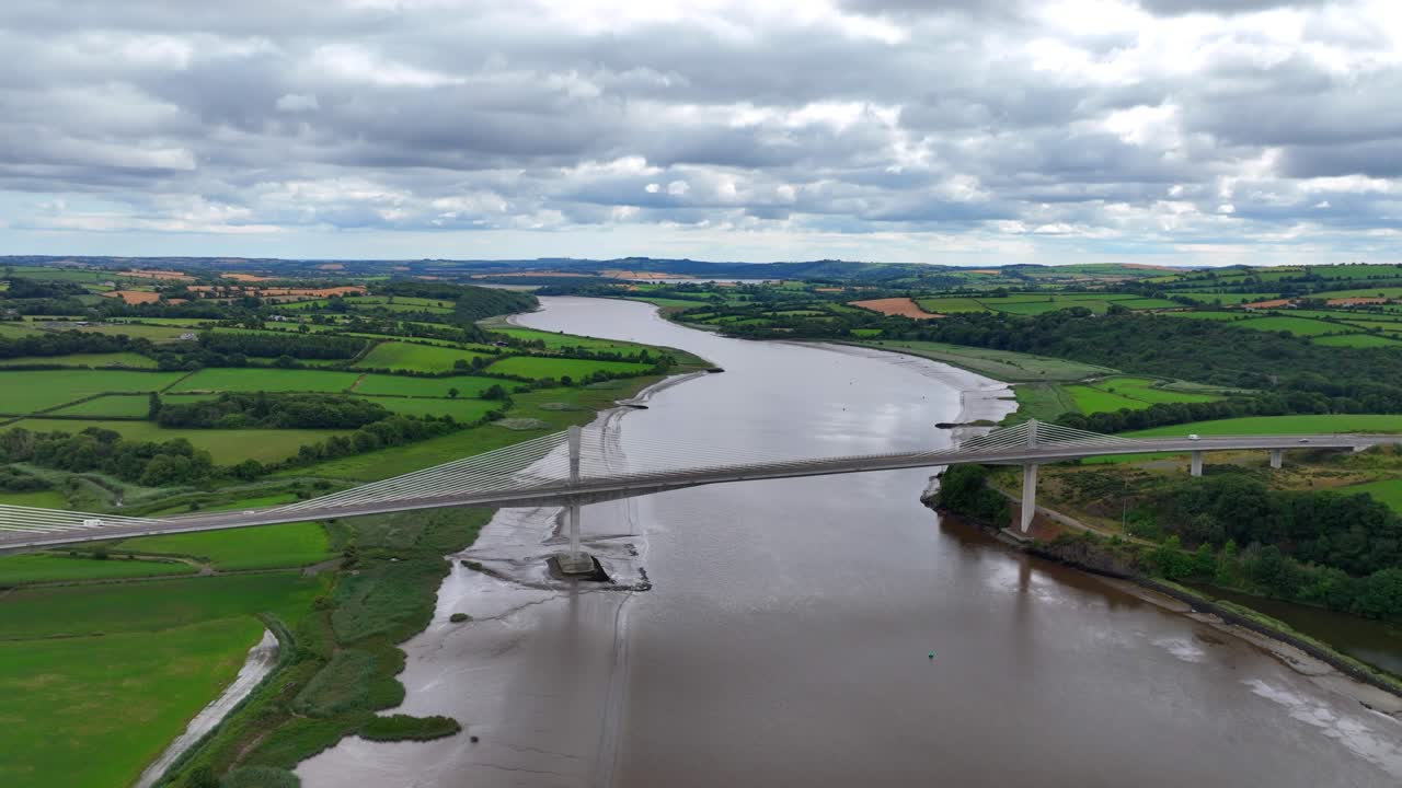 Ireland epic locations drone flying up river on the Barrow with Rose Fitzgerald Kennedy bridge