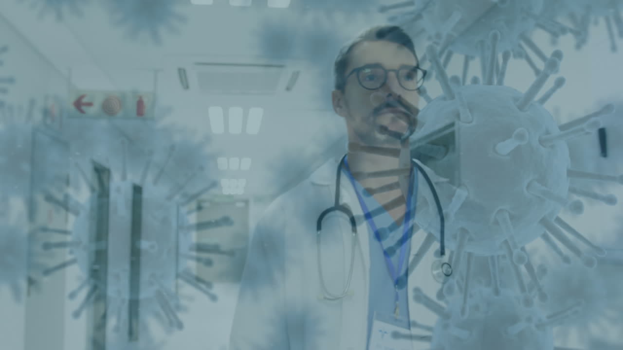 las células de covid-19 se mueven contra el médico masculino que camina en el hospital