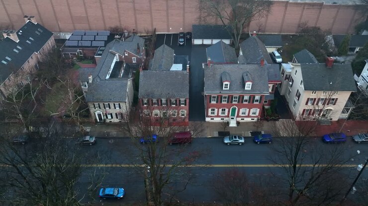 Aerial truck shot of restored colonial homes in America