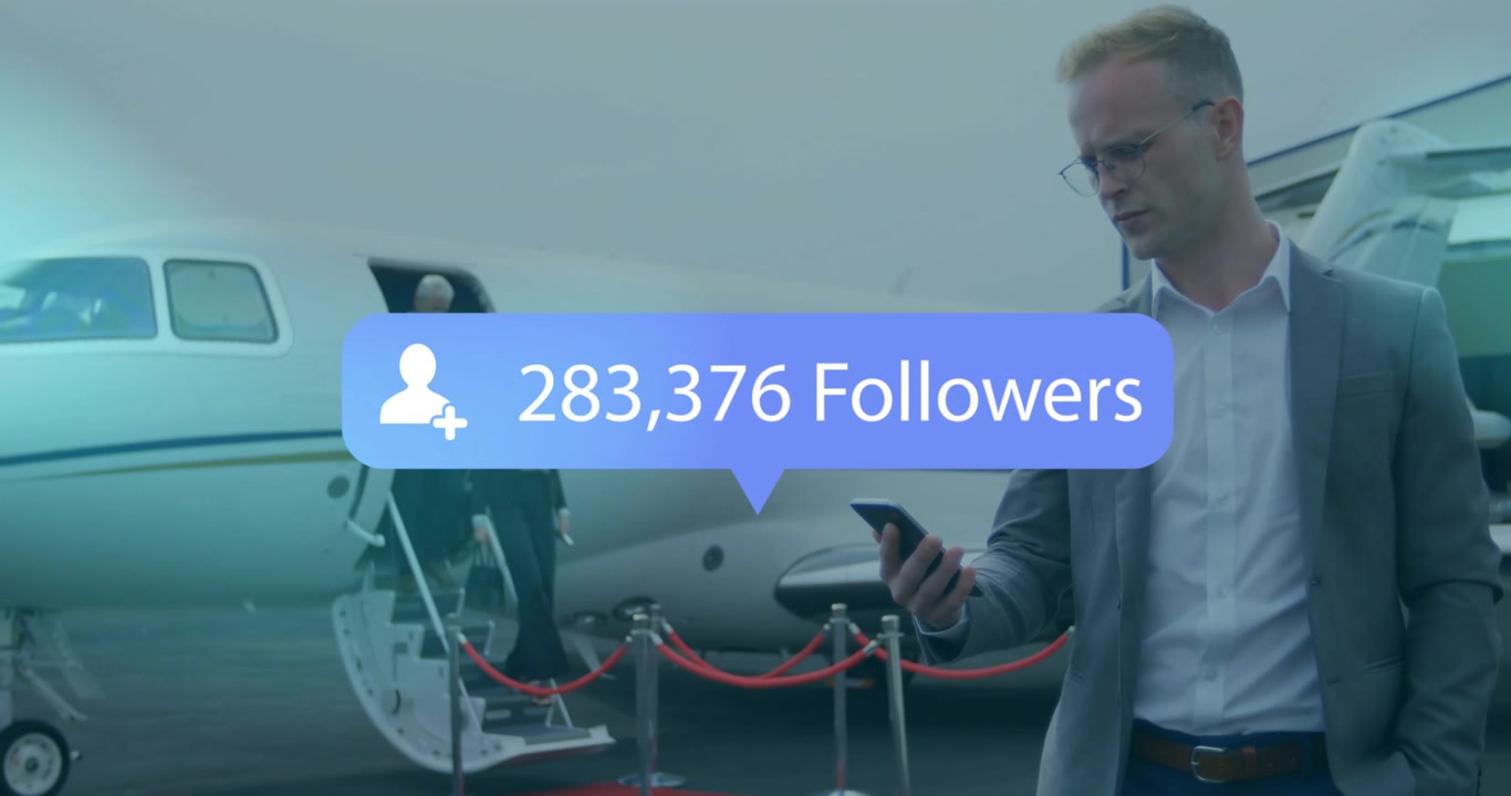 Suited man checking phone while follower bubble growing, two exiting jet walking red carpet for PR