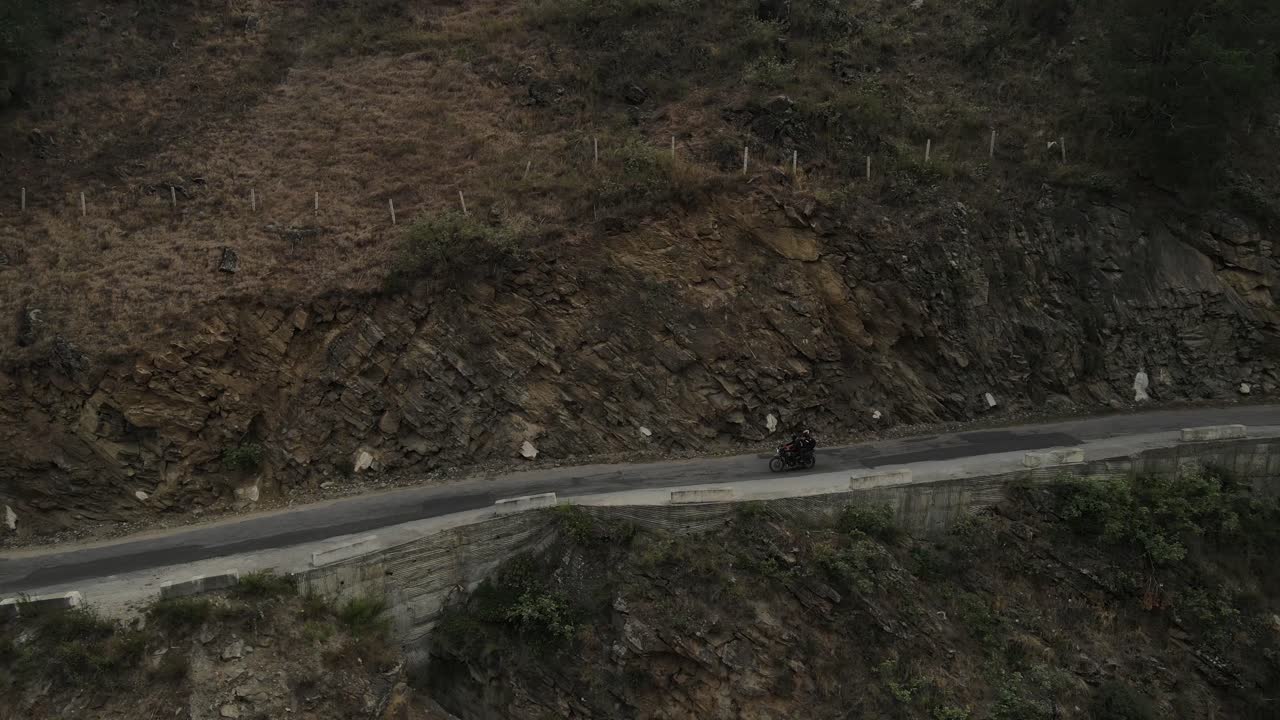 Bike riding through the dangerous road of India in Chitkul, Spiti Valley.