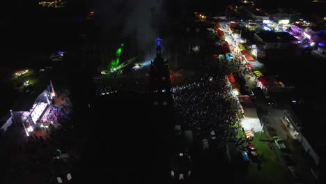 drone flying over people at pop musician concert, performance