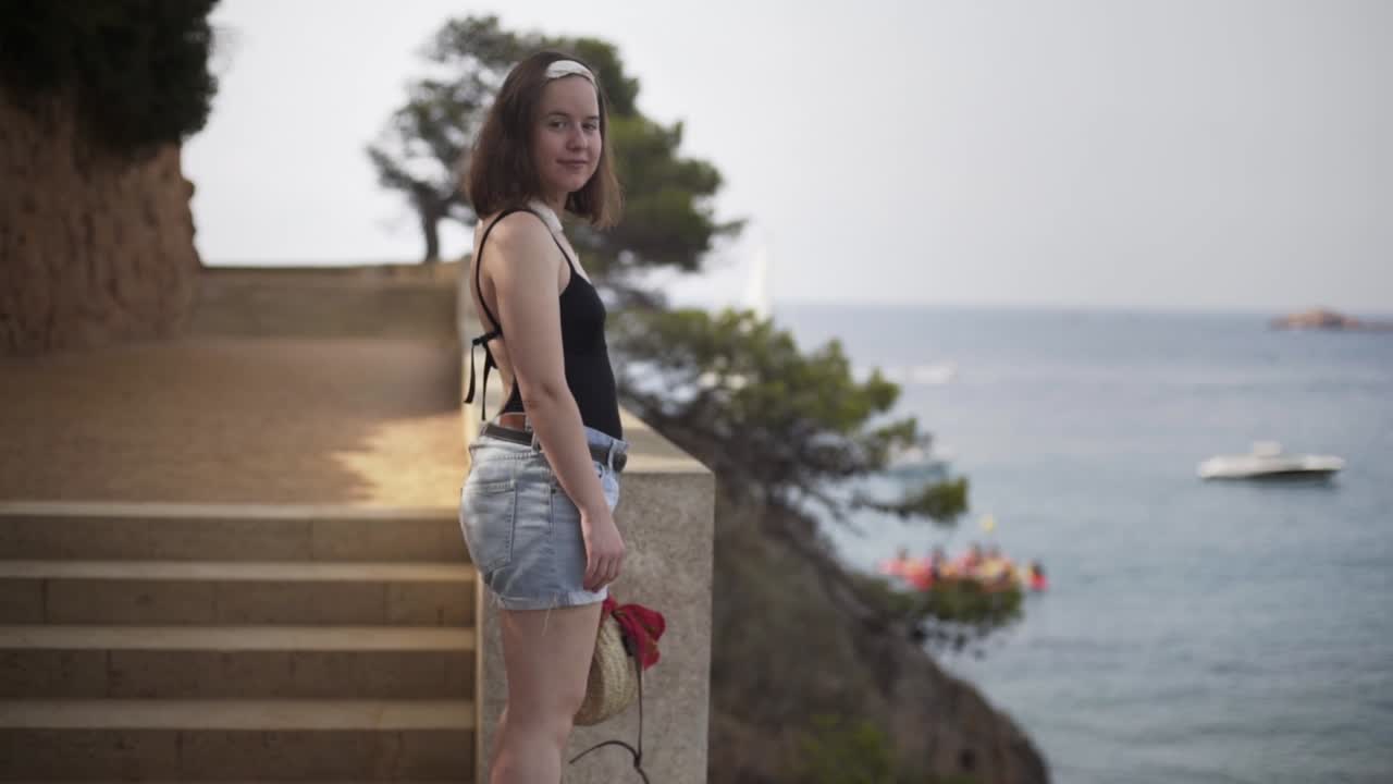 Young female model in the heavenly part of the island Costa Brava in Catalonia