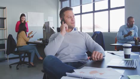 businessman on the phone in modern office