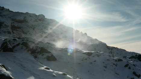 spindrift snow blowing on mountain - ben resipol - scotland