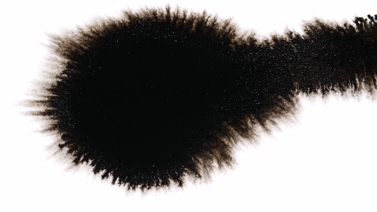 Black Ink Drops On White Background