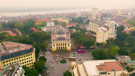 hanoi, vietnam - april, 2020: aerial panorama view of the opera house and cityscape in the city centre of hanoi.