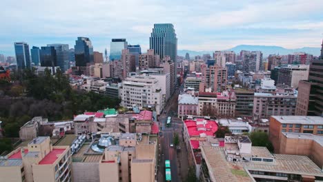 drone establishing shot of residential buildings in the bohemian neighborhood of lastarria in santiago chile, santa lucia hill