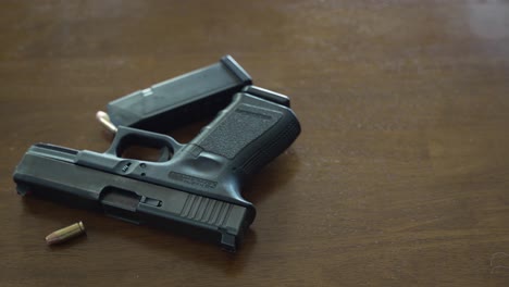 a semi-automatic handgun on the floor of a crime scene - sliding reveal