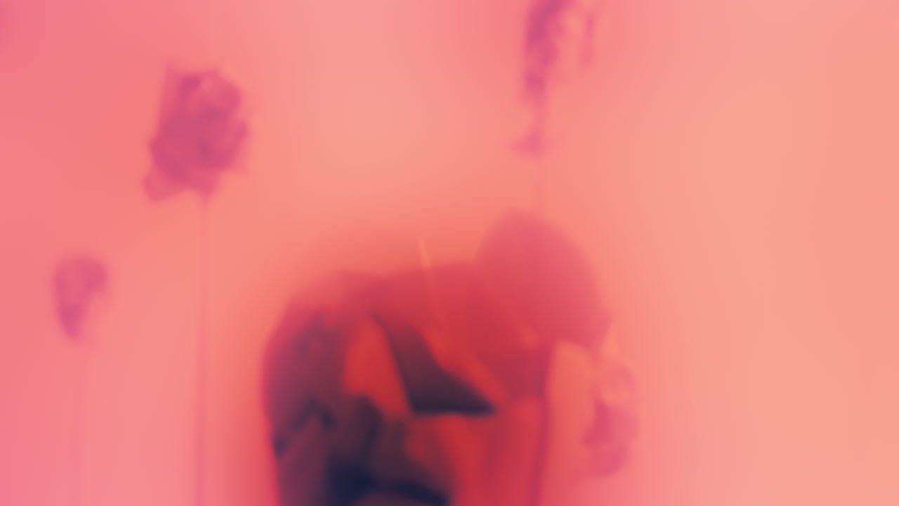 Destroyed android heads on spikes on the neon pink background