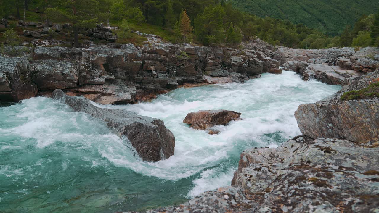 Powerful River Flowing Through Rocky Landscape