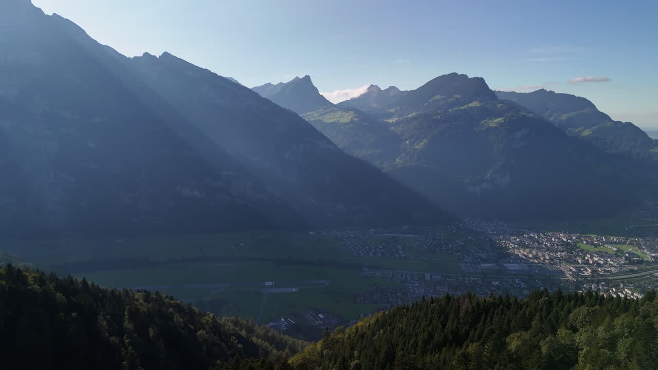 Stunning Aerial View of a Town Nestled in a Mountain Valley