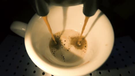 home coffee machine slowly making espresso in large cup