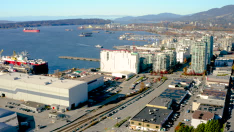 aerial flying toward the docks in north vancouver on a bright sunny day