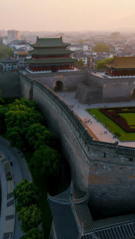 aerial view of ancient city wall and gate in china at sunset