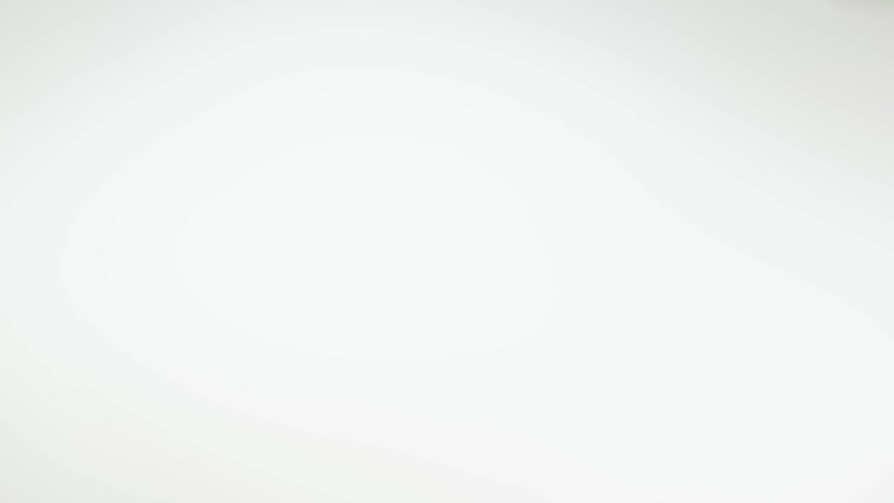 Hands pointing at X-ray images of a human spine