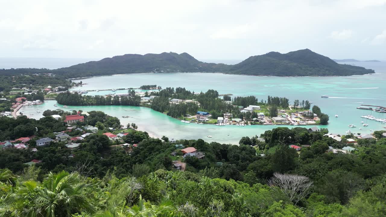 drone fly above La Digue Island, Seychelles archipelago Indian Ocean travel holiday destination with secluded tropical beach and jungle and luxury resort for dream vacation